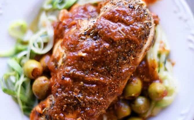 Skillet Mediterranean Chicken Recipe - This quick and easy skillet chicken recipe is packed full of flavor! Simple enough for a busy weeknight, yet perfect for entertaining! // addapinch.com