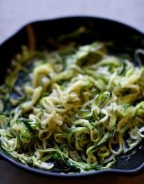Olive Oil Garlic Zucchini Noodles Recipe - These Olive Oil Garlic Zucchini Noodles are fast and fabulous for a quick and easy way to incorporate more vegetables into your meals! Made with just a handful of ingredients and ready in minutes! // addapinch.com