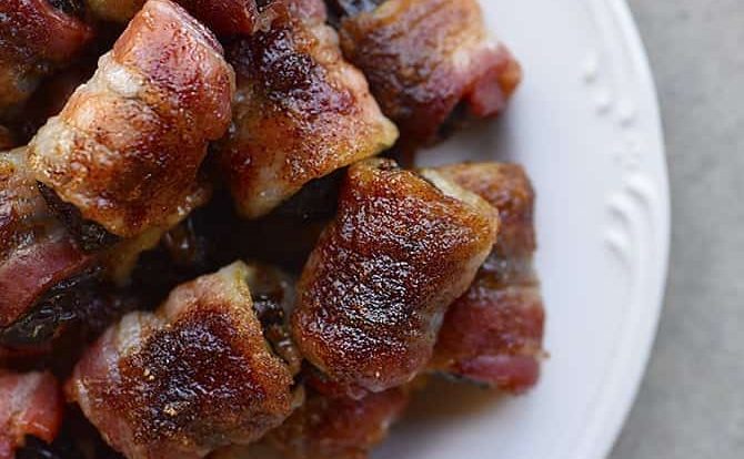 Bacon Wrapped Dates Recipe - These 5-ingredient bacon wrapped dates are out of this world delicious and so easy! // addapinch.com