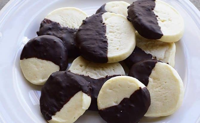Chocolate Dipped Shortbread Cookies Recipe make a festive and delicious cookie recipe that chocolate lovers adore! Perfect for a make ahead cookie recipe! // addapinch.com