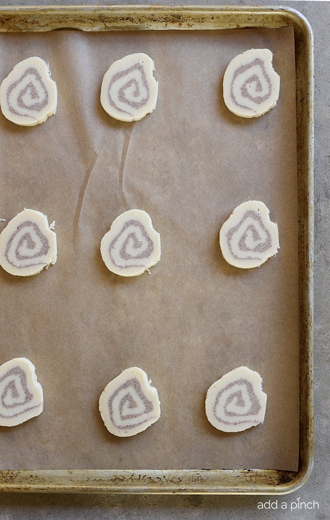 These Cinnamon Honey Bun Cookies make a delicious cookie perfect for your holiday cookie platter! // addapinch.com