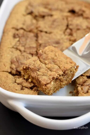 Cinnamon Swirl Oat Blondies Recipe - This Cinnamon Swirl Oat Blondie recipe is a delicious blondie made even better with the addition of oats and a fabulous cinnamon swirl throughout! // addapinch.com