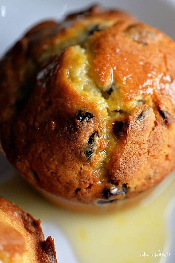 Photo of bakery-style glazed cranberry orange muffins.