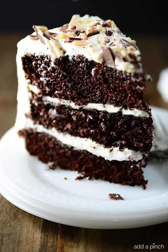 Slice of Peppermint Chocolate Cake on white plate.