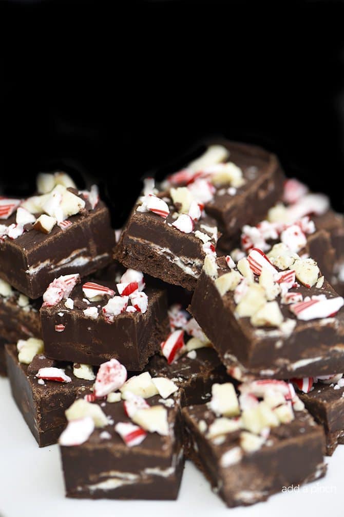 Peppermint Fudge Recipe - Peppermint Fudge makes a holiday favorite fudge recipe! A mint and chocolate lovers' dream! // addapinch.com