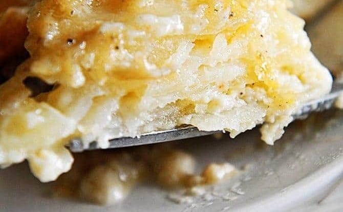 Scalloped Potatoes Recipe - This easy scalloped potatoes recipe is so creamy, cheesy, and out of this world delicious! // addapinch.com