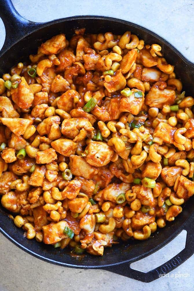 Cashew Chicken Recipe - This Cashew Chicken recipe makes a favorite quick and easy recipe perfect for busy weeknights! Ready and on the table faster than takeout! // addapinch.com