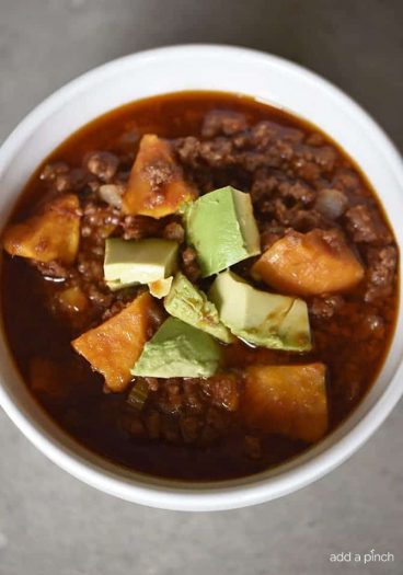 Instant Pot Sweet Potato Chili Recipe - This Instant Pot Sweet Potato Chili makes a hearty, delicious chili recipe in minutes! Made with ground beef, sweet potatoes, and packed with flavor! // addapinch.com