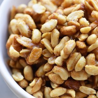 Honey Roasted Peanuts Recipe - Honey Roasted Peanuts make a delicious snack! Made with just four ingredients with one addition if you prefer them spicy! // addapinch.com