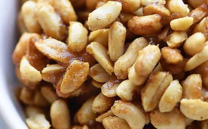 Honey Roasted Peanuts Recipe - Honey Roasted Peanuts make a delicious snack! Made with just four ingredients with one addition if you prefer them spicy! // addapinch.com