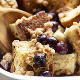 Baked Blueberry French Toast Recipe - This Baked Blueberry French Toast makes a delicious breakfast or brunch recipe! Made with bread, blueberries, maple syrup and topped with a streusel topping, this is always a favorite! // addapinch.com