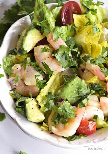 Cilantro Lime Shrimp Avocado Salad Recipe - This Cilantro Lime Shrimp Avocado Salad recipe has all the flavors of summer in every delicious bite! So quick and easy to toss together and perfect for a lunch or a light supper! // addapinch.com