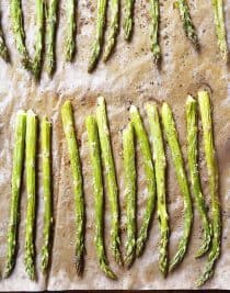 Garlic Butter Roasted Asparagus Recipe - Garlic Butter Roasted Asparagus makes a quick and easy, delicious side dish! // addapinch.com