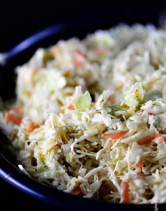 Coleslaw Recipe - A classic coleslaw recipe. Made of cabbage and topped with a delicious dressing, this coleslaw recipe is one you'll use again and again! // addapinch.com