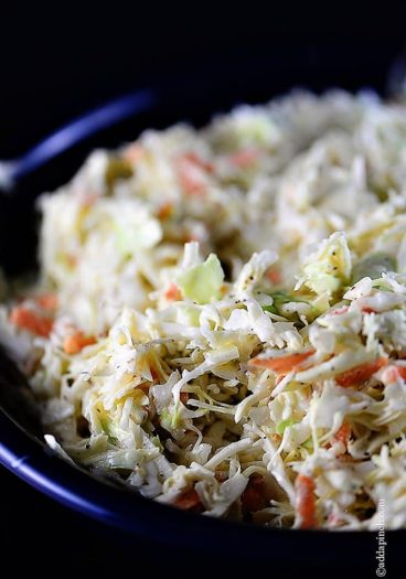 Coleslaw Recipe - A classic coleslaw recipe. Made of cabbage and topped with a delicious dressing, this coleslaw recipe is one you'll use again and again! // addapinch.com