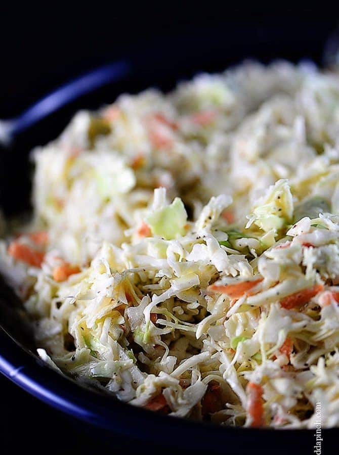 Coleslaw Recipe - A classic coleslaw recipe. Made of cabbage and topped with a delicious dressing, this coleslaw recipe is one you'll use again and again! // addapinch.com