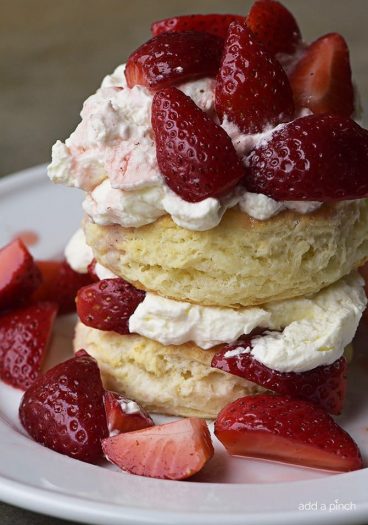 Strawberry Shortcake with Sweet Cream Cheese Biscuits Recipe - Strawberry Shortcakes with Sweet Cream Cheese Biscuits make a simple, yet scrumptious dessert recipe perfect for spring and summer! // addapinch.com