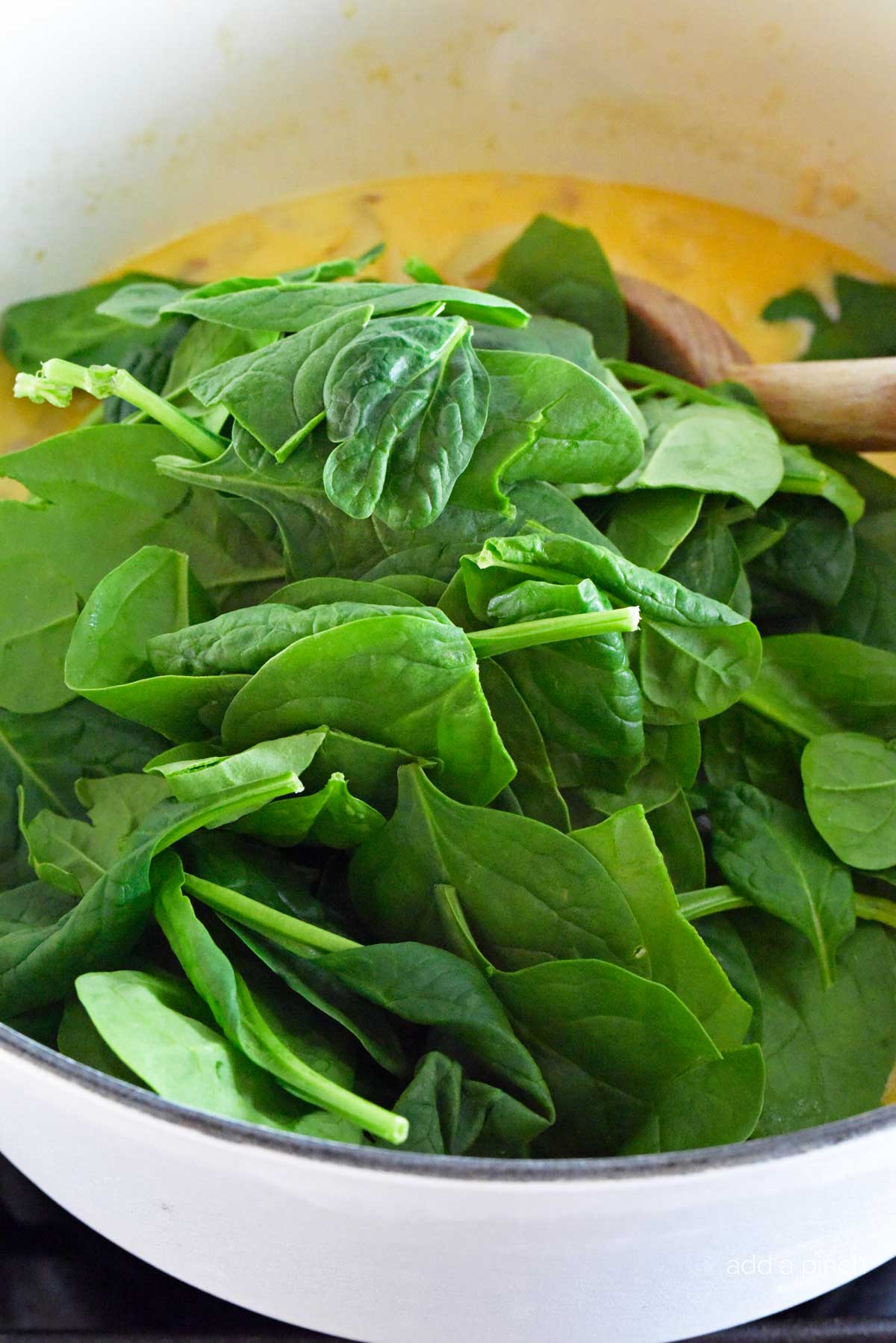 Spinach added to Zuppa Toscano 