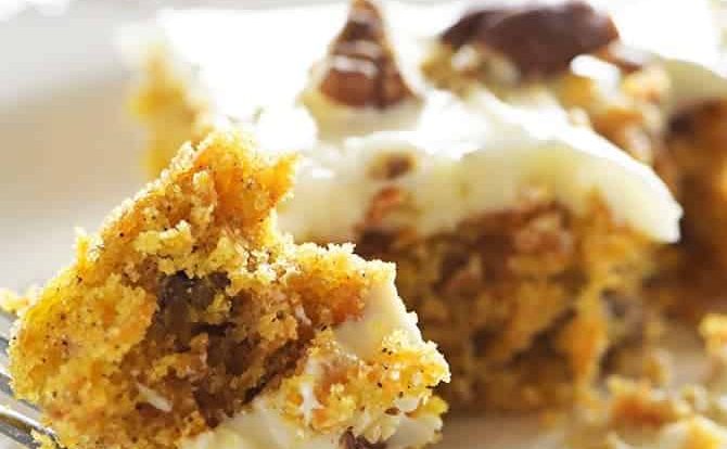 Easy Carrot Cake Sheet Cake Recipe - This Easy Carrot Cake Sheet Cake recipe comes together easily and bakes into a beautiful, delicious carrot cake! Topped with a fluffy cream cheese frosting, this carrot cake is one everyone asks for the recipe! // addapinch.com