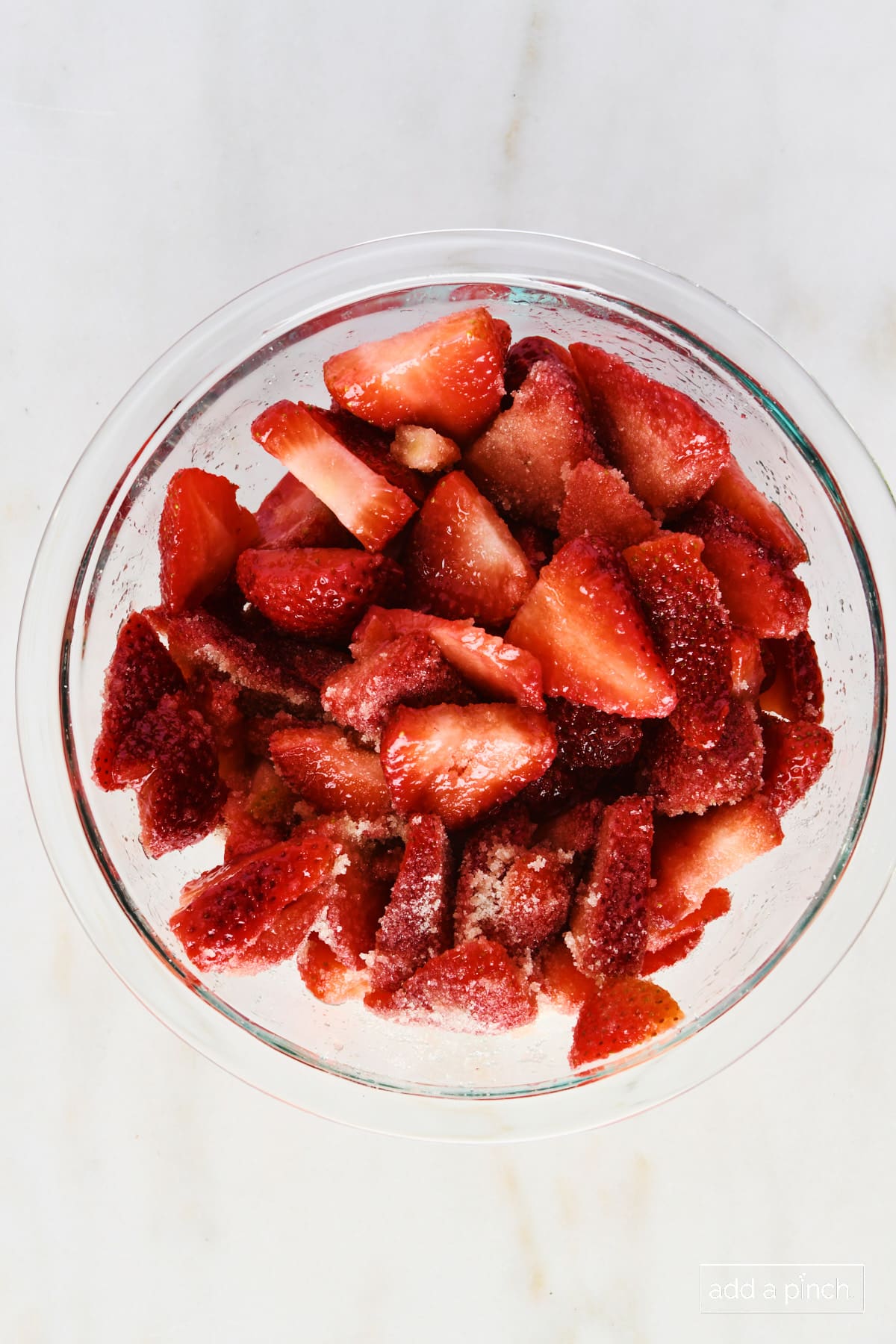 Sugared strawberries in a glass bowl