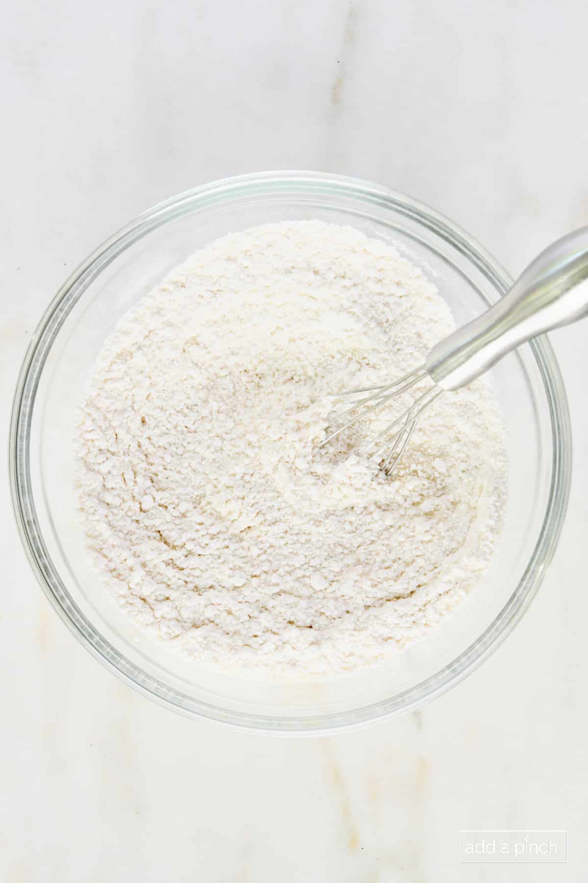 Whisked flour mixture in a glass bowl