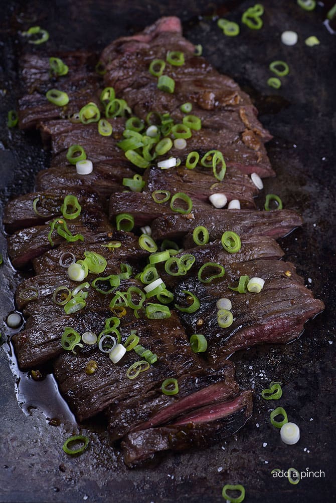 Honey Soy Skirt Steak Recipe - This honey, soy, garlic, and ginger marinade is delicious with ribeye, flank or skirt steak! Skirt steak cooks quickly, making it perfect for a weeknight, or weekend favorite! // addapinch.com