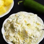 Pineapple Jalapeno Cream Cheese Spread - This quick and easy recipe comes together in a snap with just four ingredients! This sweet and spicy cream cheese spread is perfect for sandwiches, wraps, crackers or bagels! // addapinch.com