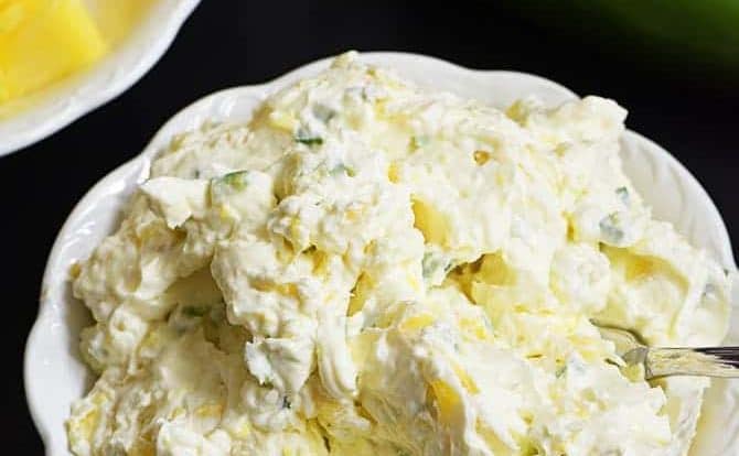 Pineapple Jalapeno Cream Cheese Spread - This quick and easy recipe comes together in a snap with just four ingredients! This sweet and spicy cream cheese spread is perfect for sandwiches, wraps, crackers or bagels! // addapinch.com