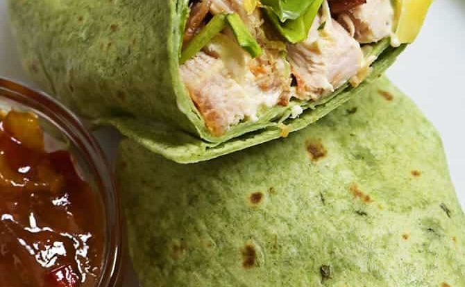 Sweet and Spicy Chicken Wraps - Quick, easy and oh so delicious! This chicken wraps recipe is made with chicken, bacon, cucumbers, red onions, and a special sweet and spicy spread! // addapinch.com