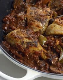Chicken Cacciatore Recipe - Chicken Cacciatore made in a flavorful tomato sauce and tender chicken is a simple, yet comforting Italian classic at its best. // addapinch.com