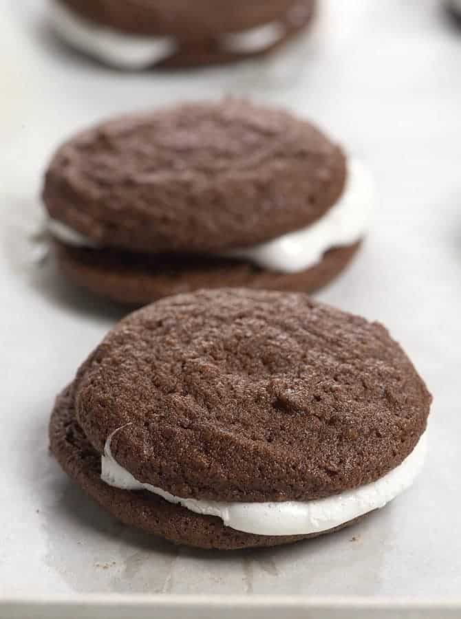 These Chocolate Marshmallow Sandwich Cookies make a delicious cookie recipe that chocolate lovers adore! So easy to make and fun to eat! // addapinch.com