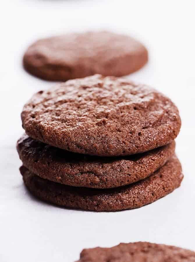 Chocolate Sugar Cookies Recipe - This easy recipe makes the best soft chocolate sugar cookies! A crisp outside with a tender, chewy center makes these cookies and absolute favorite! // addapinch.com