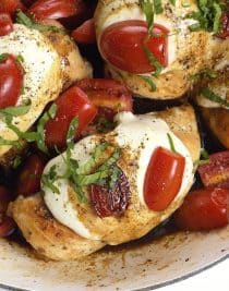 Skillet Caprese Chicken Recipe - This quick and easy chicken recipe is perfect for busy weeknights and delicious enough for entertaining! // addapinch.com