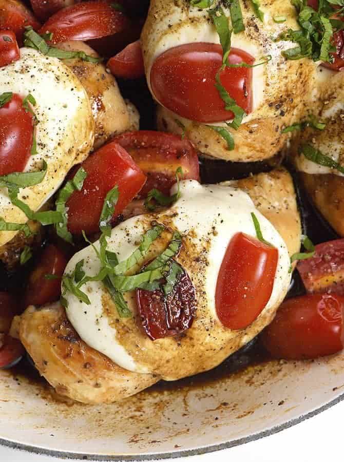 Skillet Caprese Chicken Recipe - This quick and easy chicken recipe is perfect for busy weeknights and delicious enough for entertaining! // addapinch.com