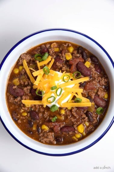 Taco Soup Recipe - So quick and easy, this taco soup recipe is flavorful and delicious! Made with ground beef, beans, corn, it is on the table in less than 30 minutes.