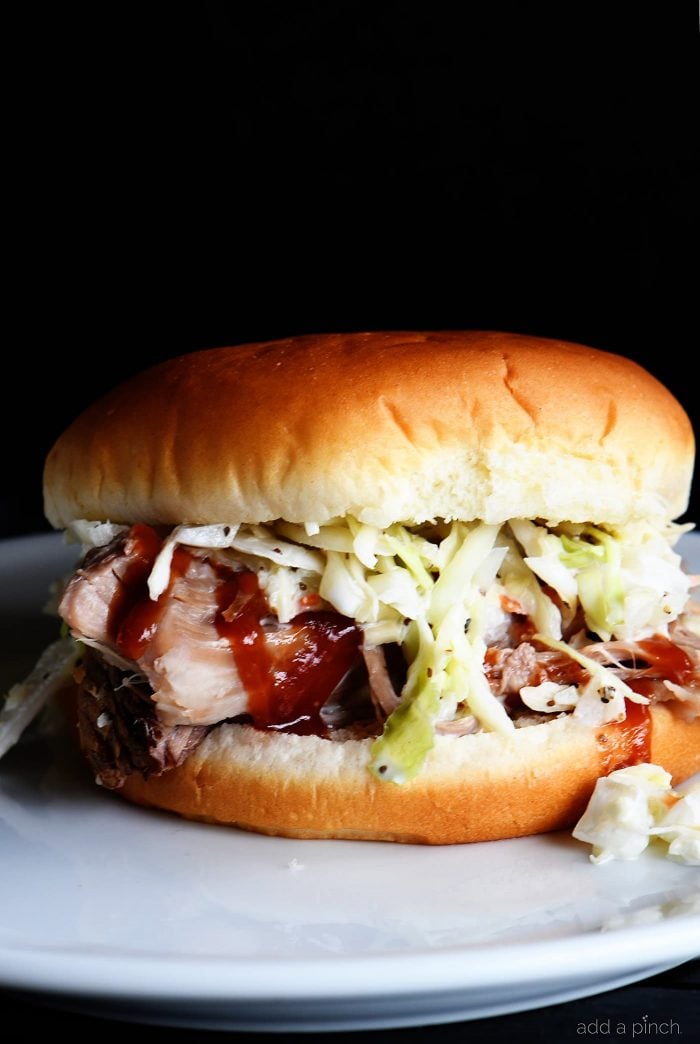 The Best Pulled Pork Recipe - This easy pulled pork recipe lets your slow cooker do all the work while making the best pulled pork! Easy, delicious, and the only pulled pork recipe you'll ever need! // addapinch.com