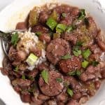 Slow Cooker Red Beans and Rice Recipe - A  traditional Creole red beans and rice recipe that everyone loves made easy in the slow cooker!  // addapinch.com