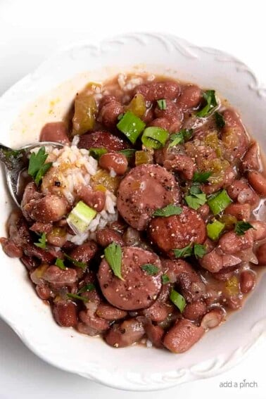 Slow Cooker Red Beans and Rice Recipe - A  traditional Creole red beans and rice recipe that everyone loves made easy in the slow cooker!  // addapinch.com