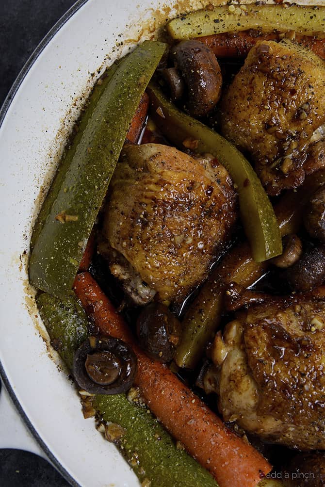 Balsamic Chicken and Vegetables Recipe - This quick and easy one pan balsamic chicken recipe is perfect for weeknight supper or easy entertaining! Ready and on the table in less than 30 minutes! // addapinch.com