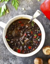 Red Pepper Mushroom Black Bean Soup Recipe - This quick and easy black bean soup recipe comes together in a snap for a vegetarian soup recipe that even meat lovers with adore! // addapinch.com