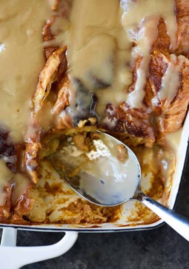 Pumpkin Bread Pudding Recipe with Maple Cream Sauce - Imagine if pumpkin pie and bread pudding came together for the most epic fall recipe! Perfect for the holidays and entertaining! // addapinch.com