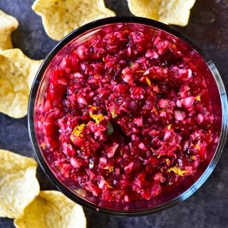 Orange Cranberry Salsa Recipe - Fresh cranberry salsa is a sweet fruit salsa recipe that adds color, flavor and wow to any dish! Perfect throughout the holidays! // addapinch.com