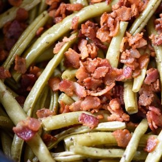 Slow Cooker Green Beans Recipe - These are the best slow cooker green beans and have everyone coming back for more! // addapinch.com