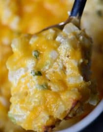 Hashbrown Casserole Recipe - A cheesy potato side dish that comes together in a snap! Perfect to serve when entertaining and a staple on the holiday table! // addapinch.com