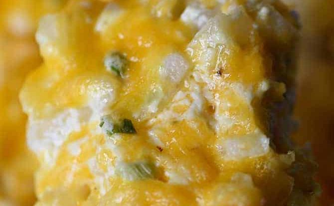 Hashbrown Casserole Recipe - A cheesy potato side dish that comes together in a snap! Perfect to serve when entertaining and a staple on the holiday table! // addapinch.com