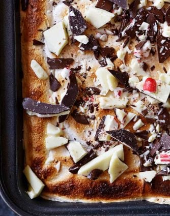 Peppermint Bark Brownies Recipe - Peppermint bark meets your favorite brownies in this quick, easy and delicious recipe! // addapinch.com