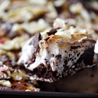 Peppermint Bark Brownies Recipe - Peppermint bark meets your favorite brownies in this quick, easy and delicious recipe! // addapinch.com