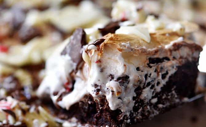 Peppermint Bark Brownies Recipe - Peppermint bark meets your favorite brownies in this quick, easy and delicious recipe! // addapinch.com