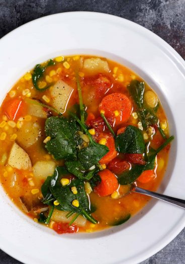 Lentil Vegetable Soup Recipe - This easy one pot Lentil Vegetable Soup recipe is a warm, comforting and delicious soup recipe! Gluten-free, vegetarian and vegan, but one that even meat lovers love! // addapinch.com