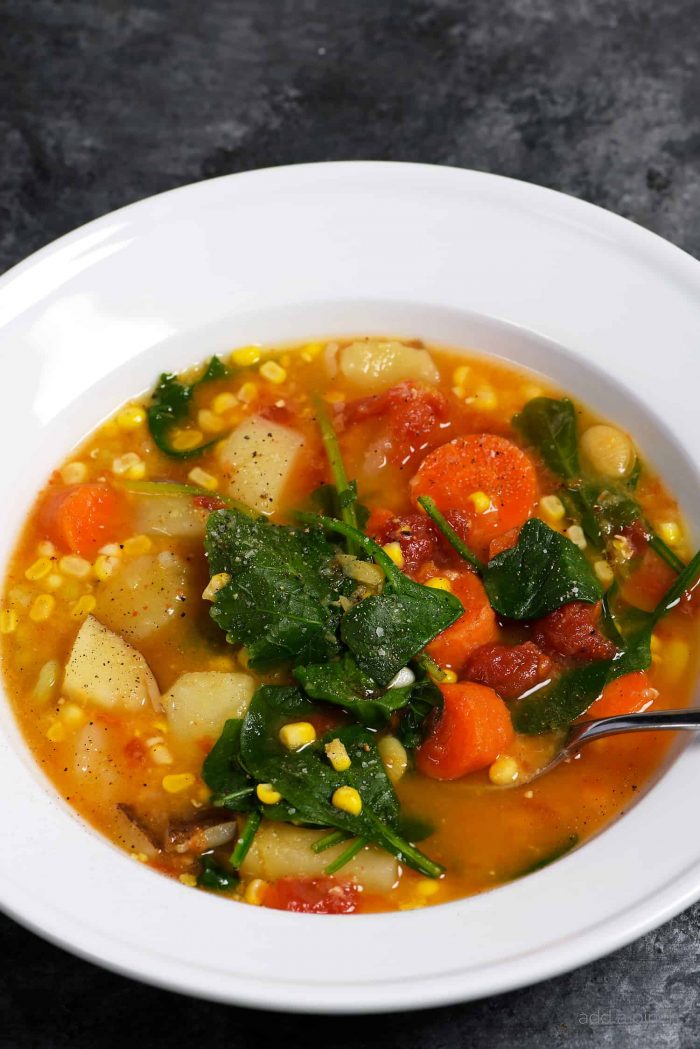 Lentil Vegetable Soup Recipe - This easy one pot Lentil Vegetable Soup recipe is a warm, comforting and delicious soup recipe! Gluten-free, vegetarian and vegan, but one that even meat lovers love! // addapinch.com